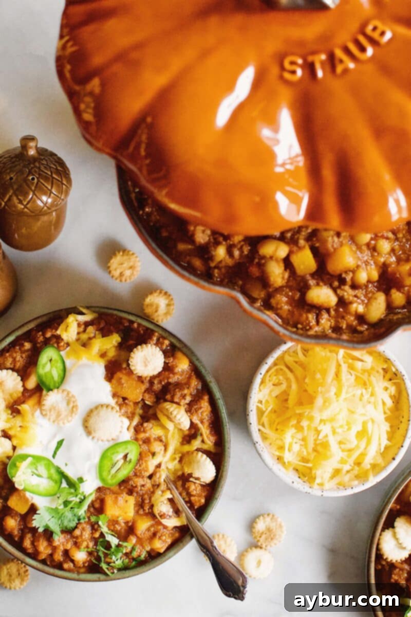 Harvest Pumpkin Chili 5 Pumpkin Chili being dished out from the staub pumpkin pot.