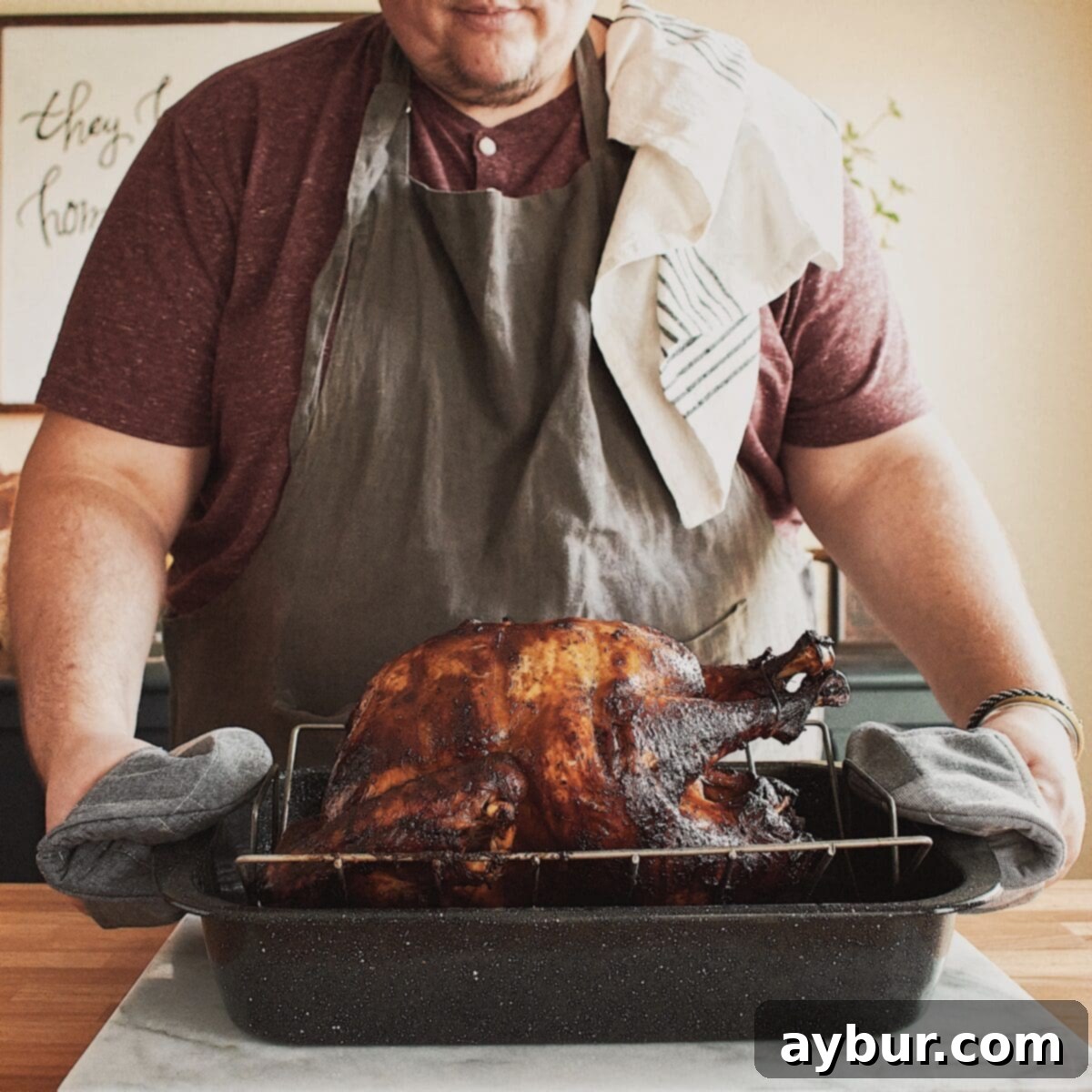 Sweet and Savory Maple-Soy Glazed Roast Turkey 4 A glistening Soy Maple Turkey, golden brown and perfectly roasted, just removed from the oven and resting in the pan.