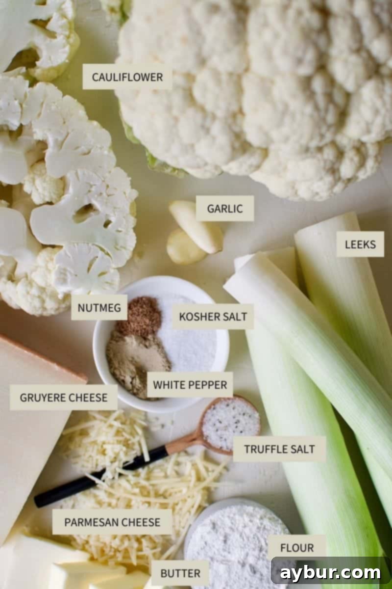 Cheesy Cauliflower and Leek Gratin 3 All the fresh ingredients required to make Cauliflower Leek Gratin laid out on a table.