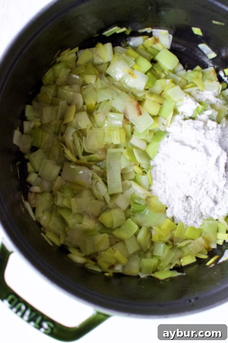 Cheesy Cauliflower and Leek Gratin 6 Cooked leeks and garlic simmering in butter, forming the base of the gratin sauce.
