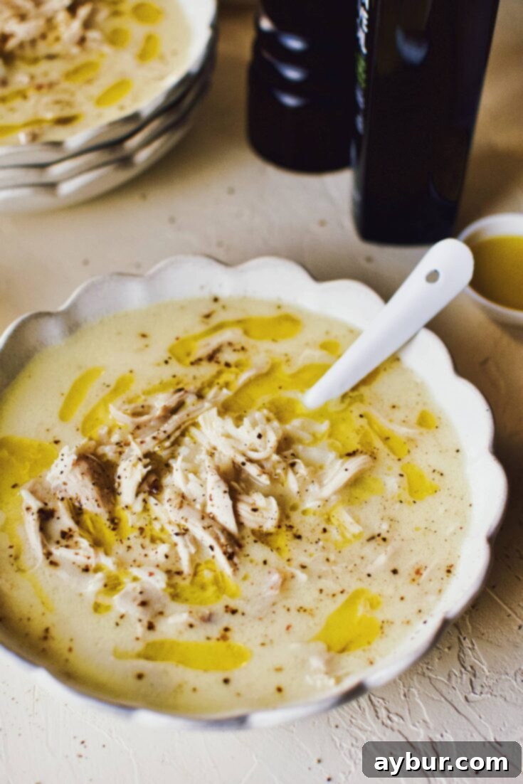 Zesty Greek Avgolemono Chicken Rice Soup 9 Greek Avgolemono Lemon Rice Soup in a white bowl ready to eat.