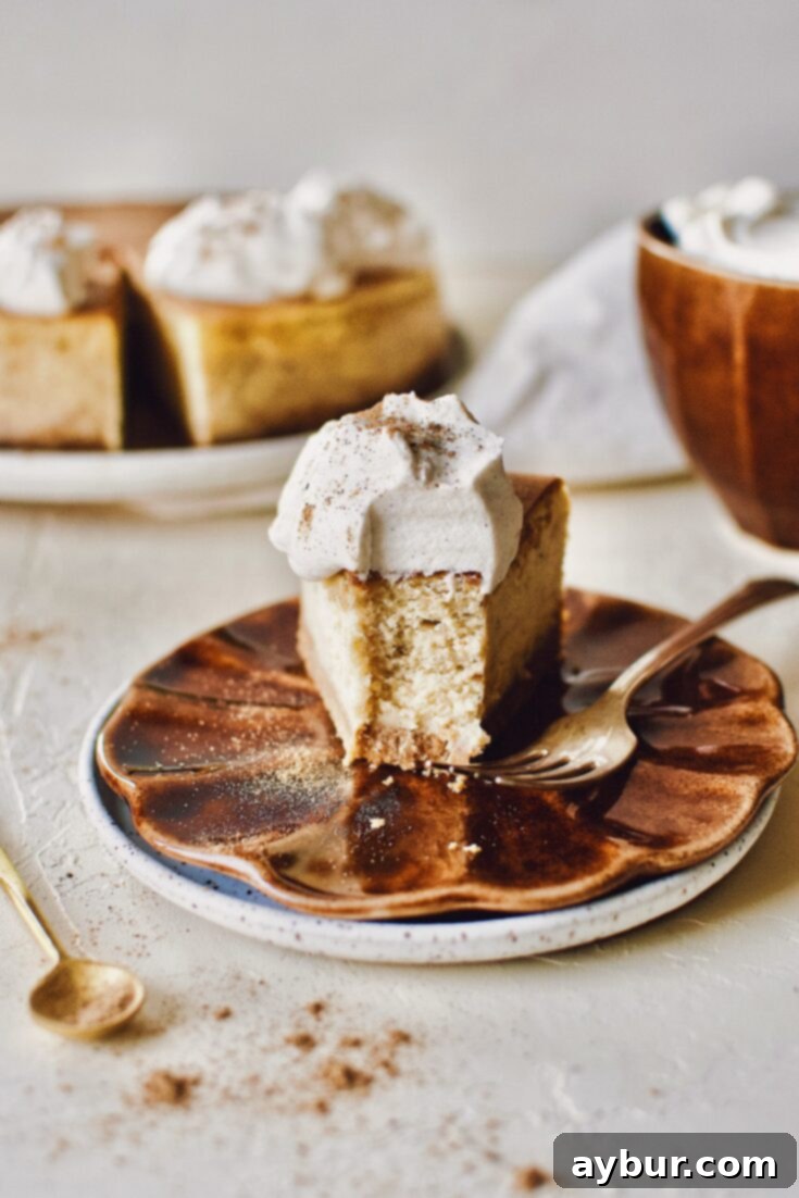 Chai-Spiced Cheesecake with a bite taken out of it.