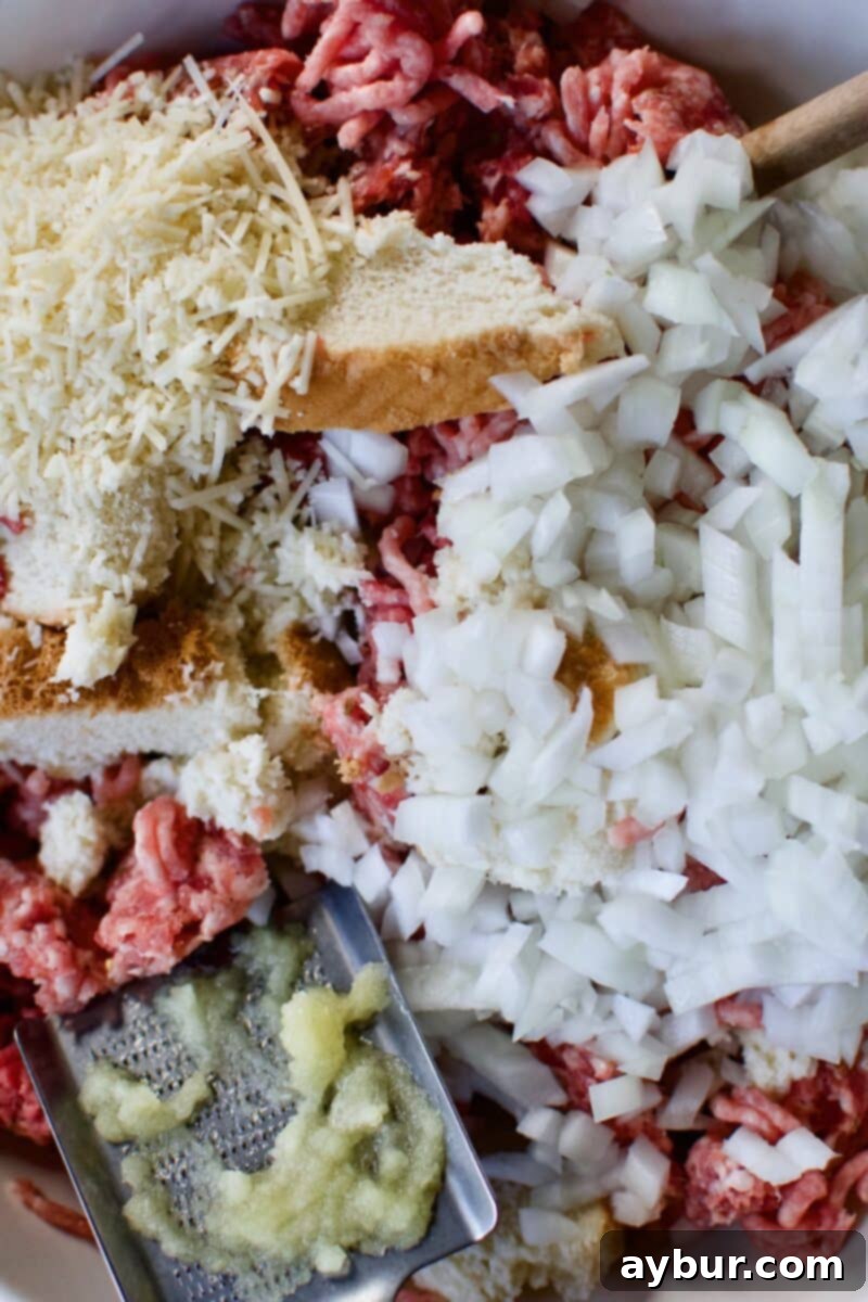 Mega Meatball Masterpiece 6 Various meatball ingredients, including herbs and spices, meticulously arranged around a large mixing bowl.