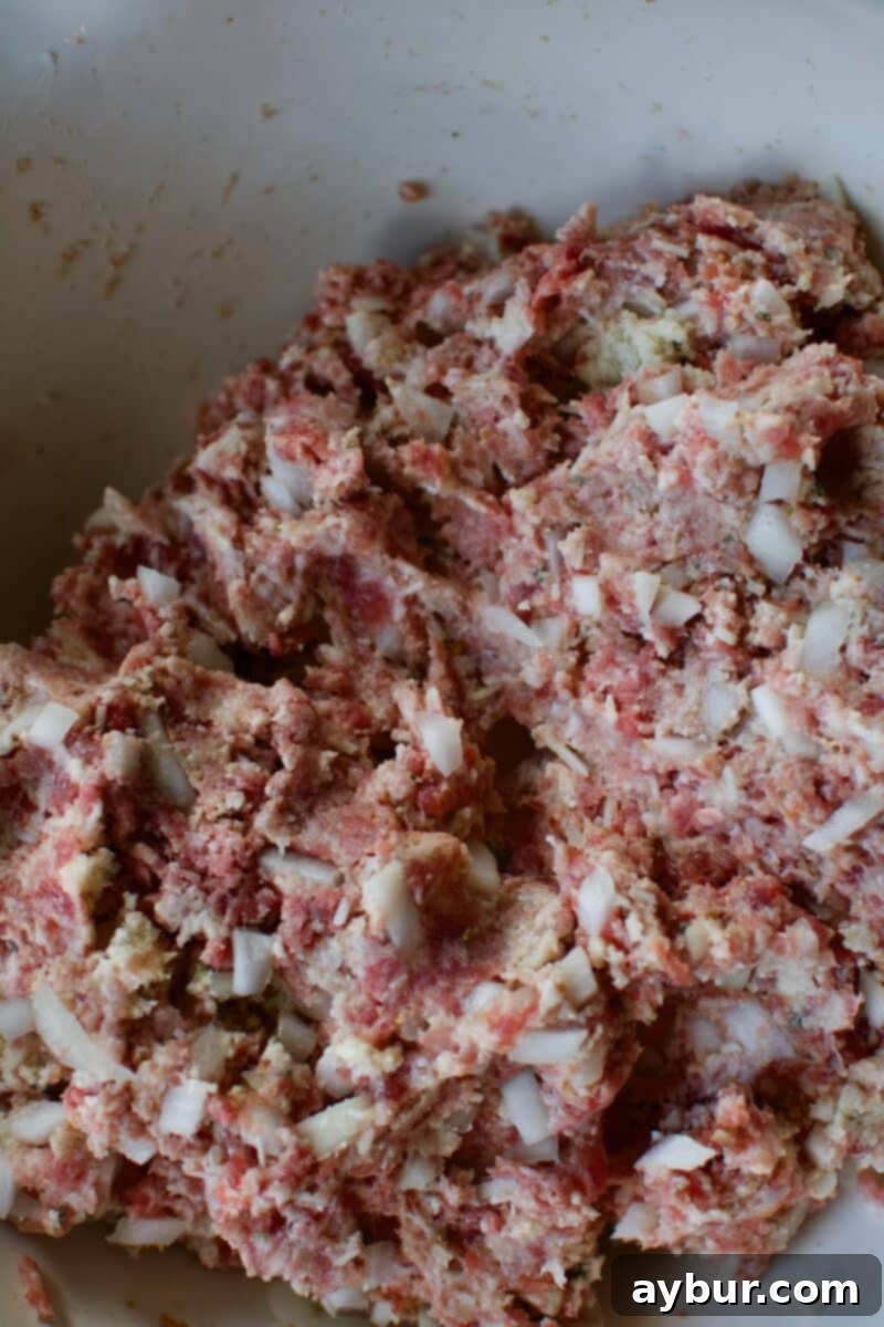 Mega Meatball Masterpiece 8 The fully mixed meatball mixture, perfectly combined and ready to be portioned into giant meatballs.