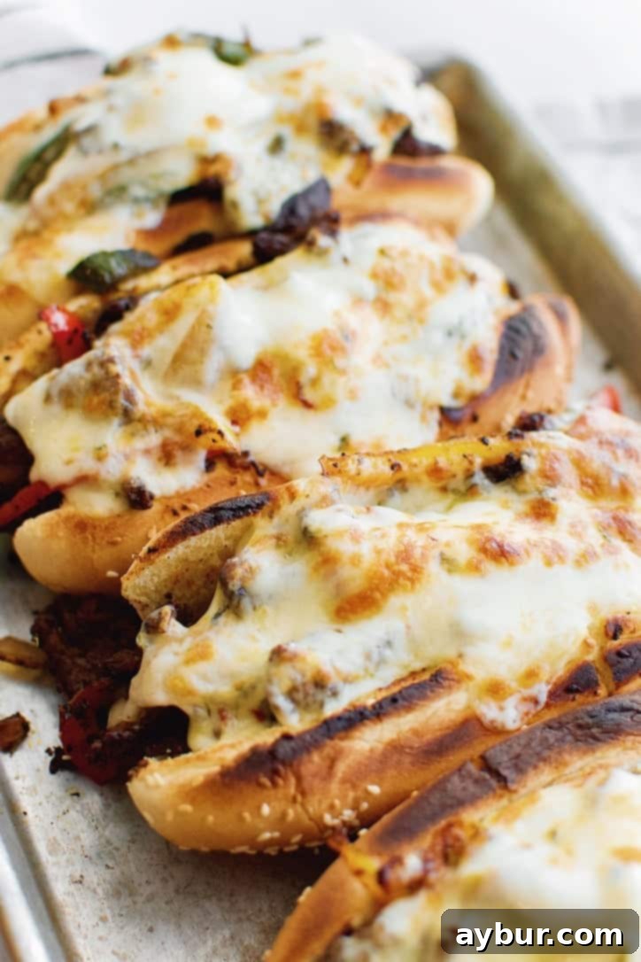 A final, mouth-watering image of Joanna Gaines's rendition of Philly Cheesesteaks from the Magnolia Table Cookbook Vol. 2, ready for enjoyment.