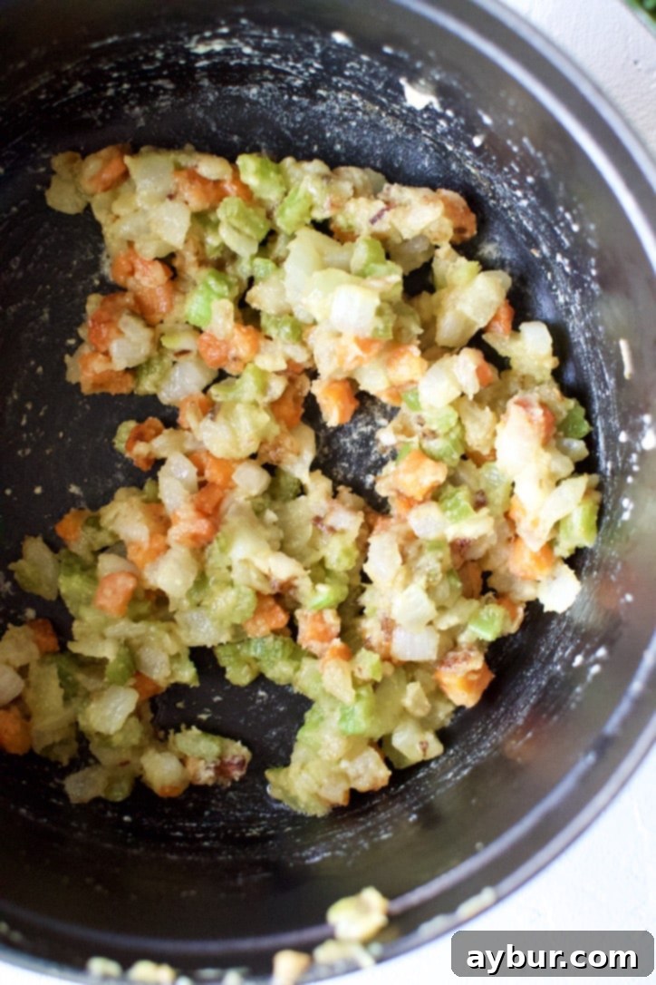 Diced onion, garlic, carrot, and celery sauteed in butter, with flour added to the pot to make a roux.