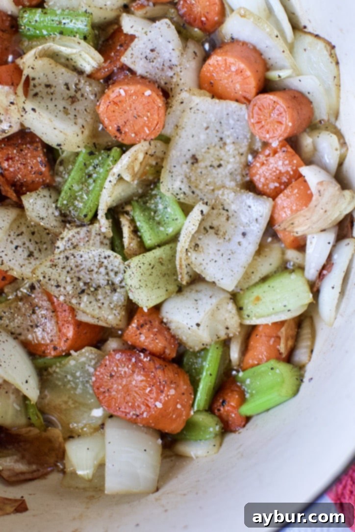 Vegetables cooking in the beef fat released from searing the short ribs. After 5 minutes and seasoned with salt and pepper.