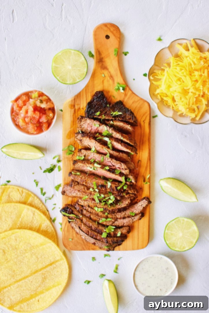 Carne Asada Fajita Steak on a chopping board.