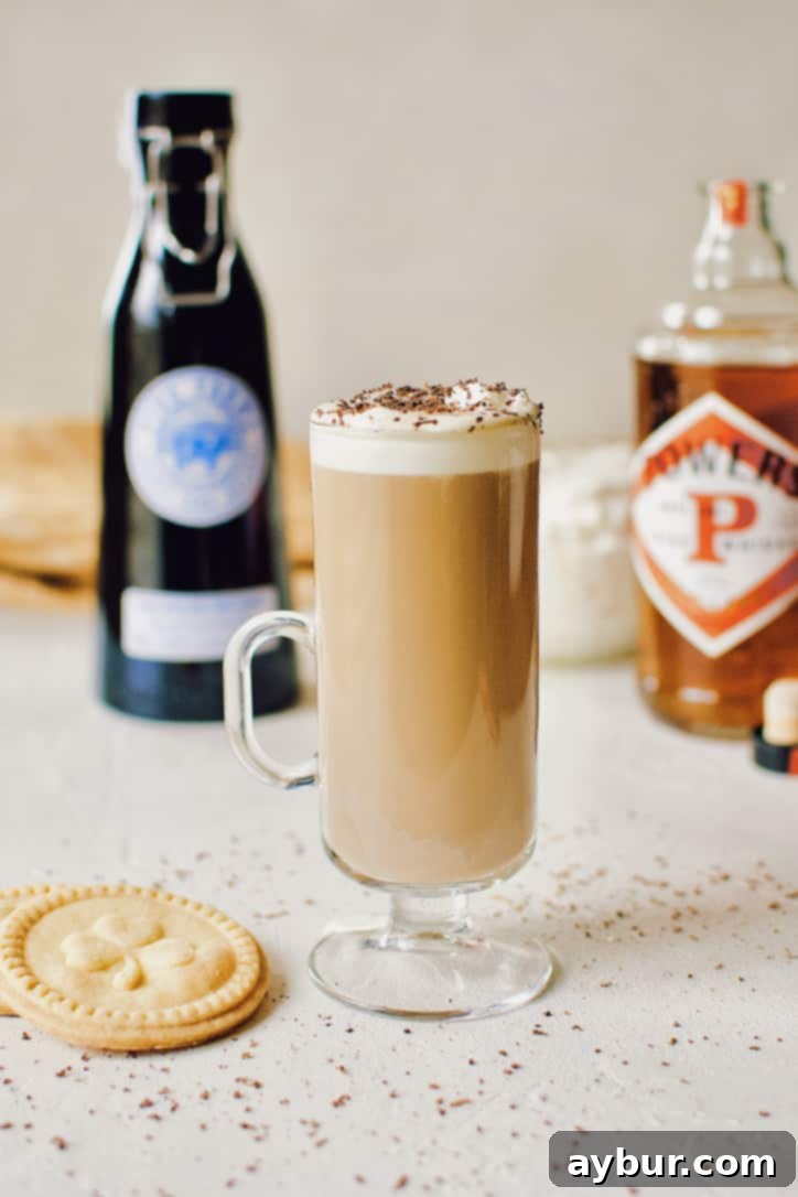 Freshly made Classic Irish Coffee with a thick layer of whipped cream and chocolate shavings