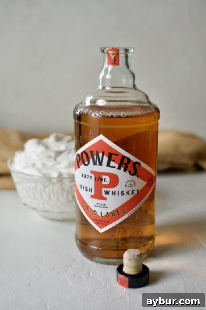 Bottle of Powers Irish Whiskey, a recommended choice for authentic Irish Coffee
