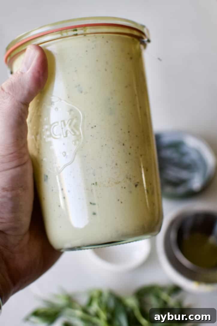 Tarragon Vinaigrette vigorously shaken together in a jar.