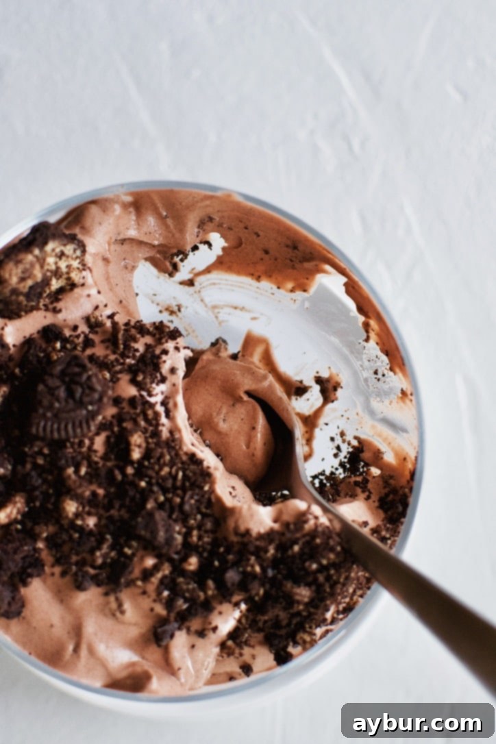 Delicious Chocolate Peanut Butter Oreo Dirt Pudding, artfully arranged in individual cups, ready to serve.