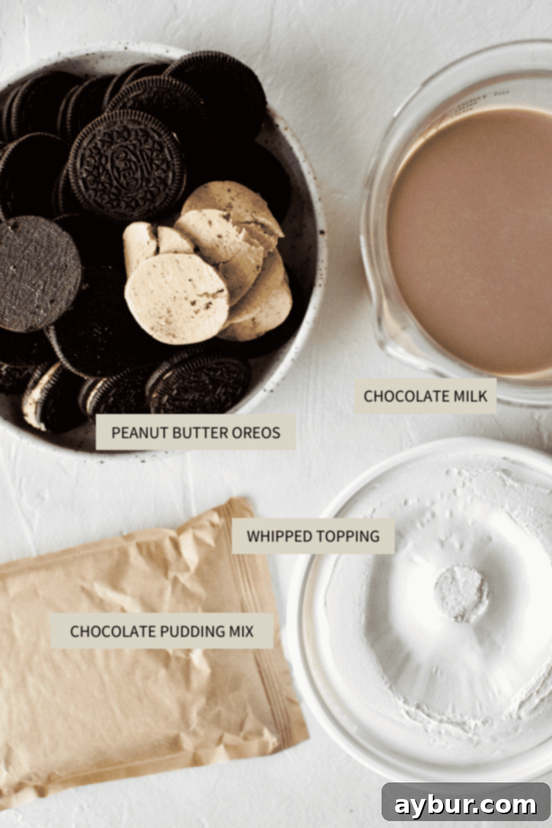 Ingredients needed to make Chocolate Peanut Butter Oreo Dirt Pudding, including Peanut Butter Oreos, chocolate milk, chocolate pudding mix, and whipped topping.