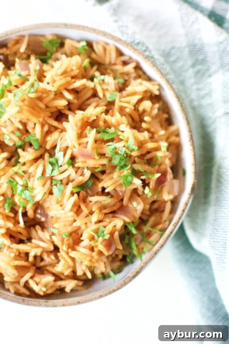 Weta Rice in a serving bowl, topped with Cilantro.