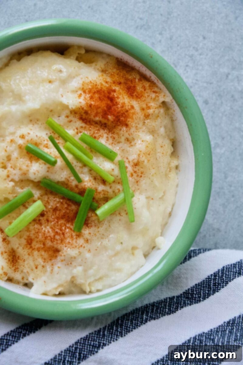 Garlic Cheddar Grits from the Magnolia Table Cookbook Prepared by KendellKreations