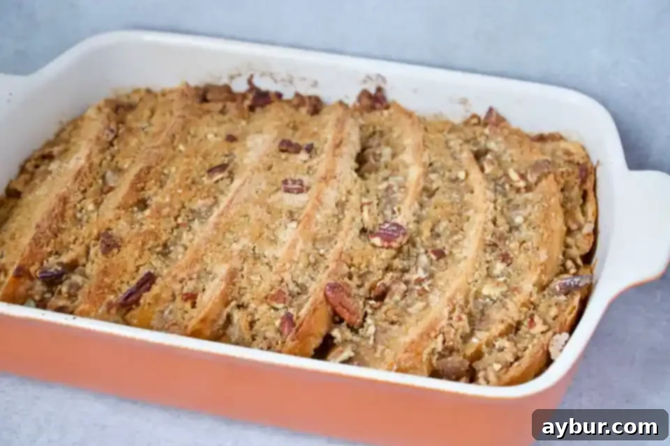 Overnight French Toast: Effortless Sunday Mornings 3 Overnight French Toast from the Magnolia Table Cookbook Prepared by KendellKreations, showing the golden interior and soft texture.