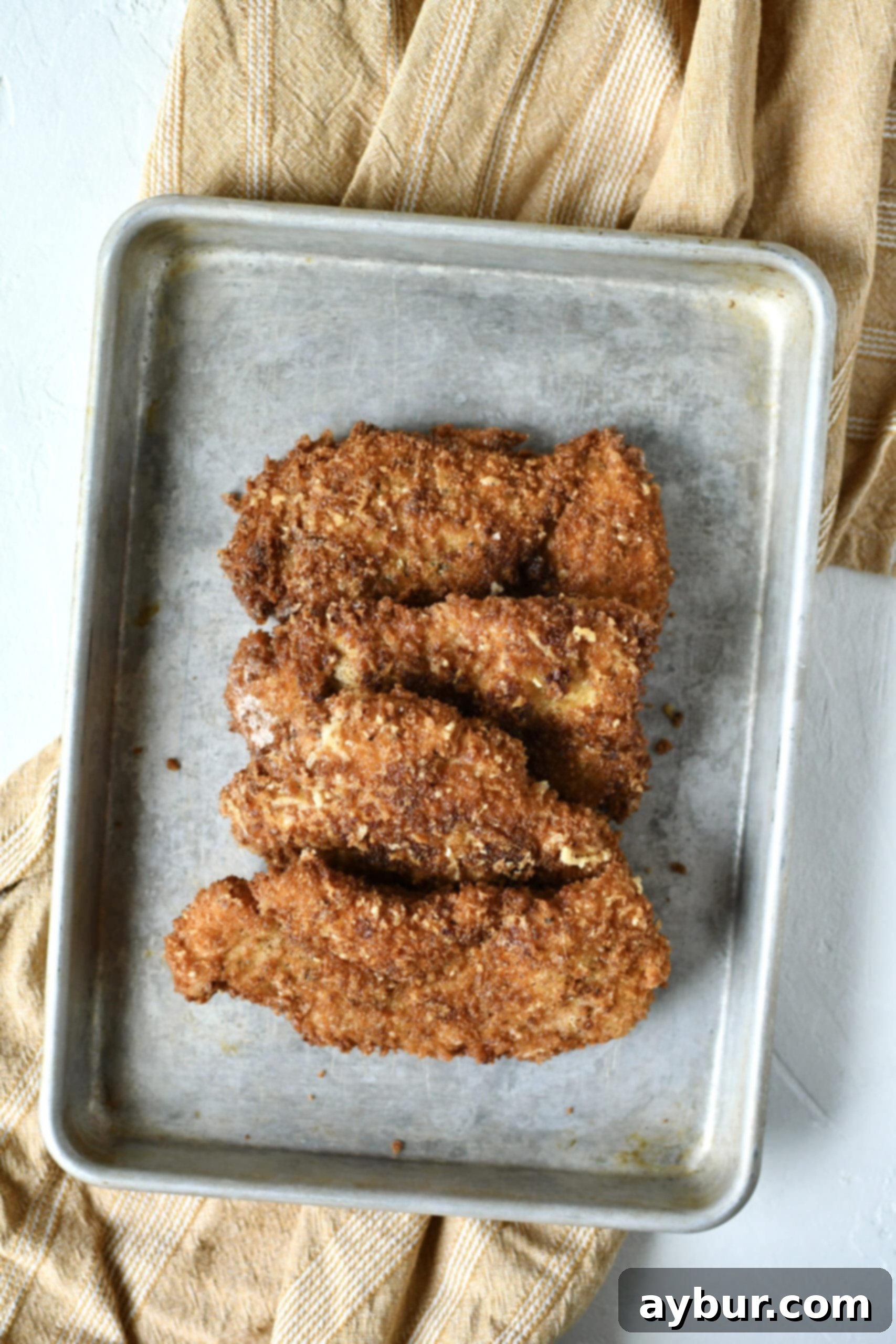 Crispy Parmesan Chicken, perfectly fried to a golden brown and ready to serve.