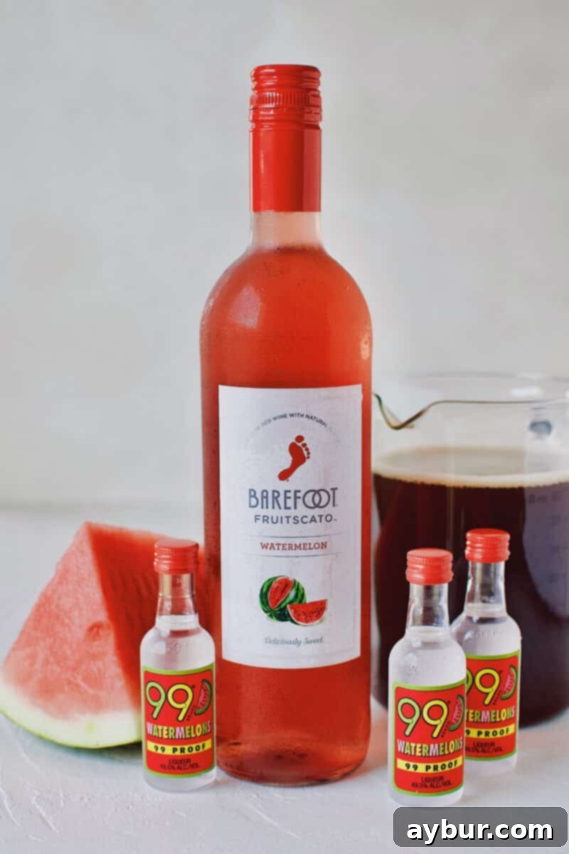 Assortment of ingredients including tea, wine, spirits, and fresh watermelon for sangria.