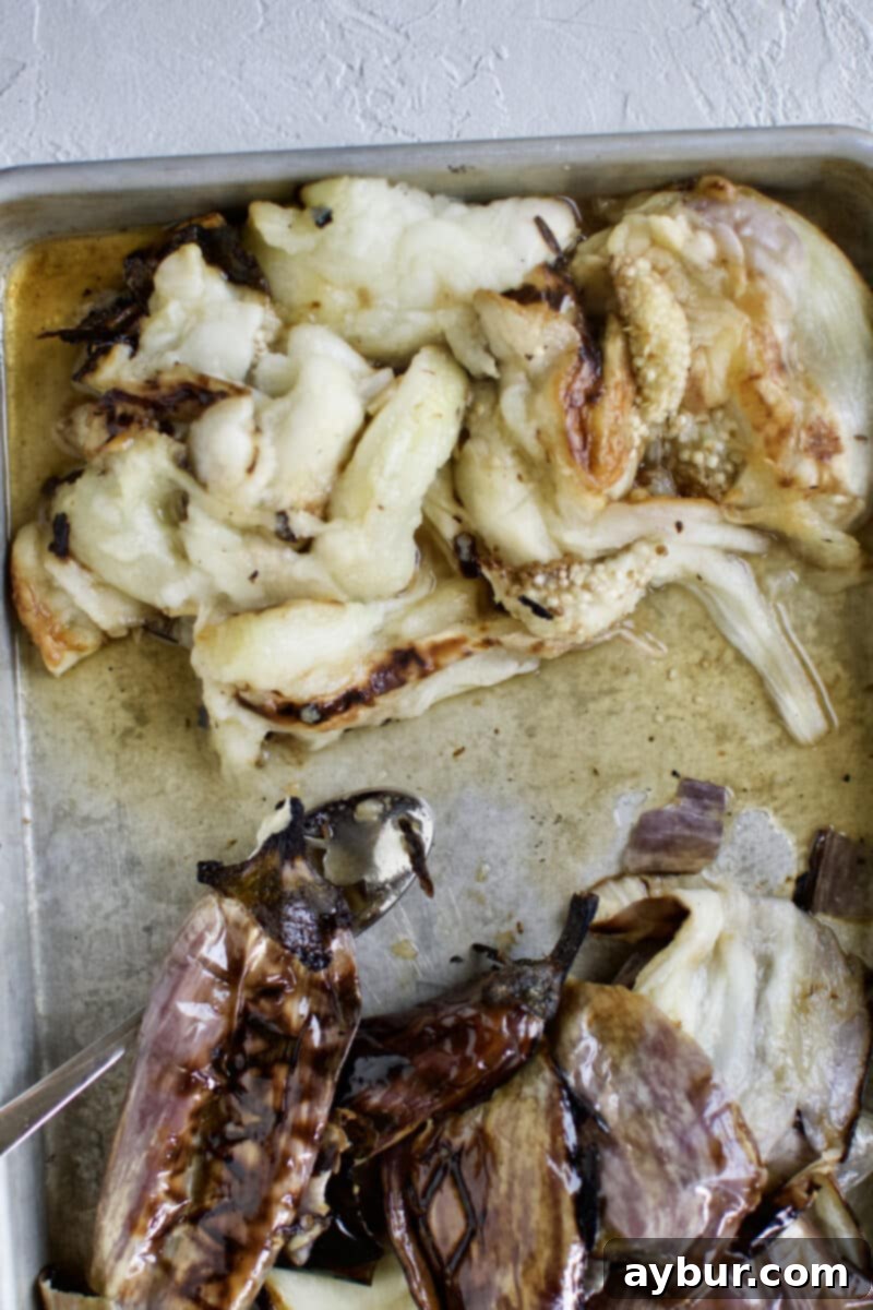 Smoky Baba Ghanoush with Golden Garlic 11 Perfectly cooked eggplant flesh scraped out of its charred skins.