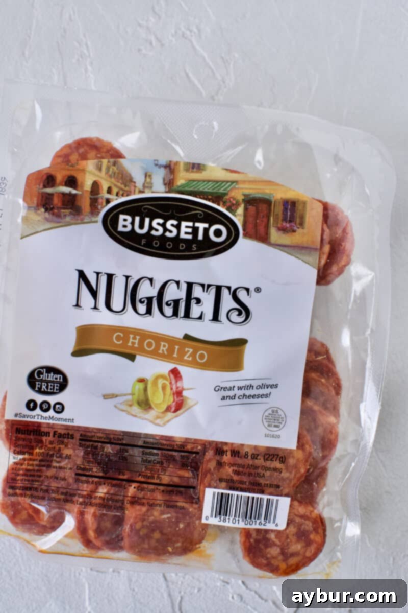 Linguine with Clams 3 Close-up shot of cured Spanish chorizo, diced and ready for cooking, highlighting its vibrant color and texture as a key flavor enhancer in the clam sauce recipe.