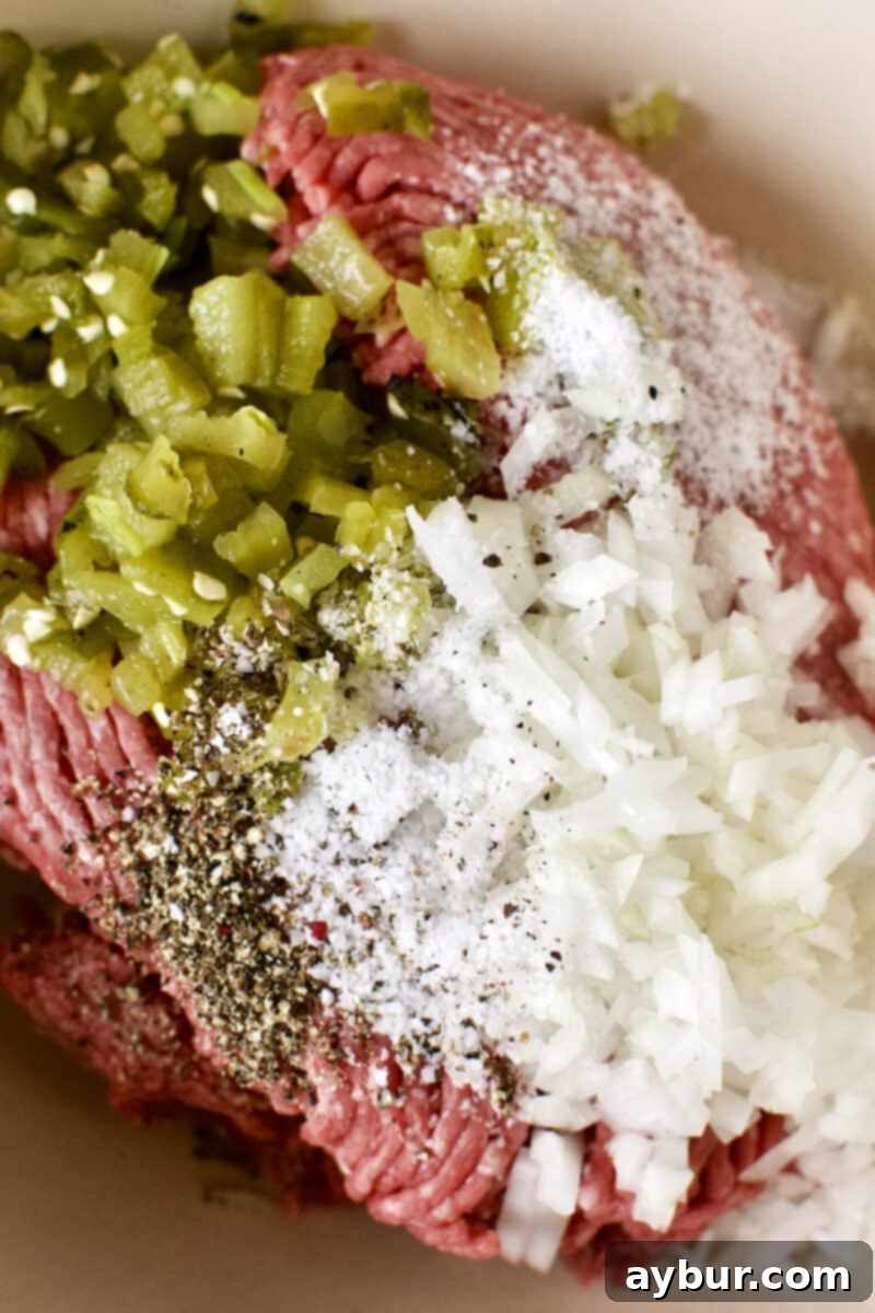 Adding all the prepared ingredients into a large bowl, ready for mixing.