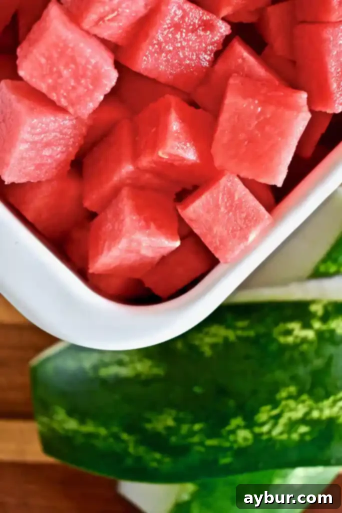 Perfectly diced watermelon cubes in a bowl, ready for enjoyment or storage
