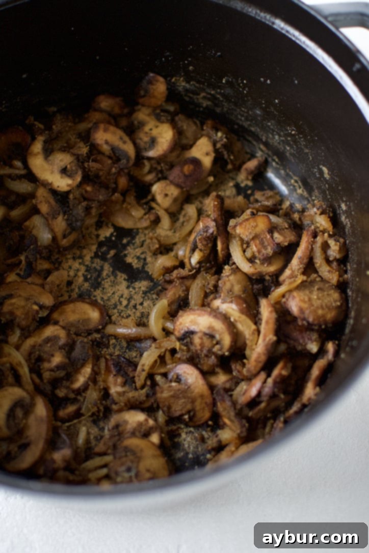 A perfectly formed roux, lightly browned, after cooking the flour with butter and vegetables, ready for liquid.