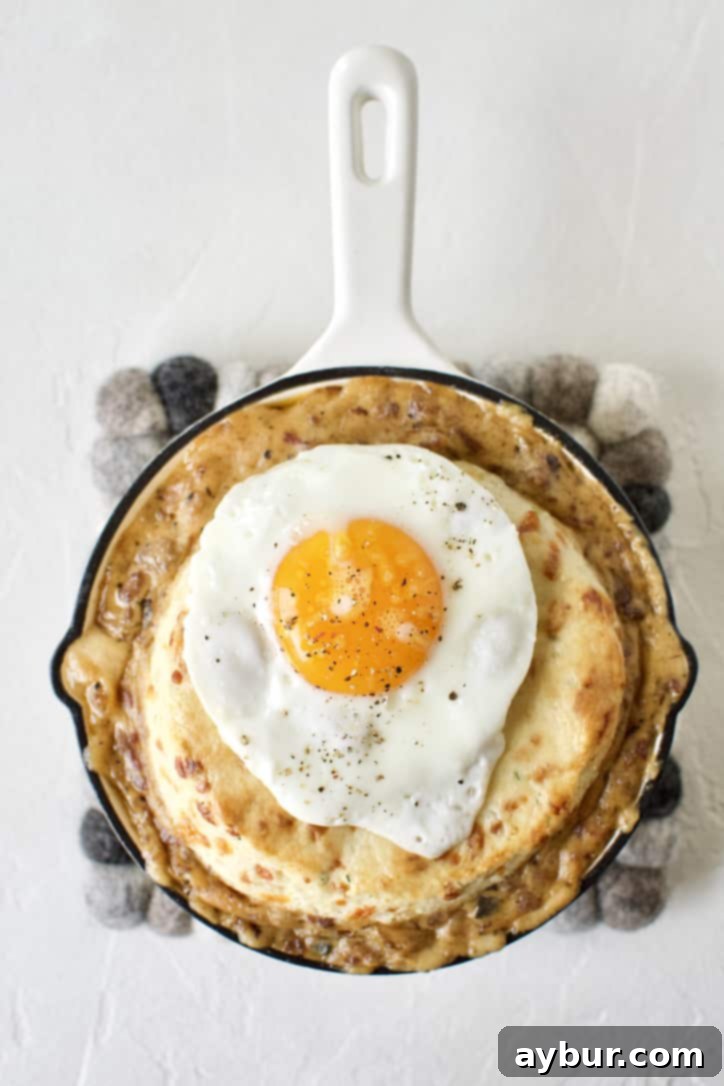 Sunrise Pie 12 Breakfast Pie ready to eat. Topped with a fried egg.