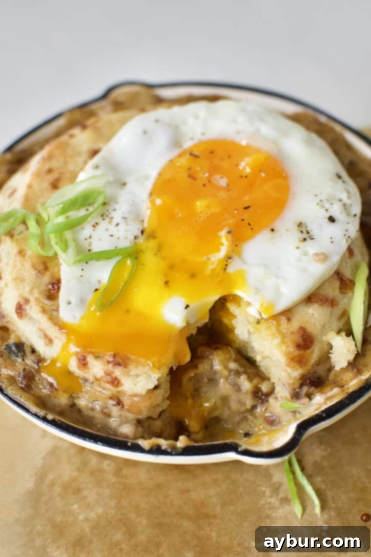 Sunrise Pie 14 Breakfast Pie ready to eat. Topped with a fried egg and green onions.