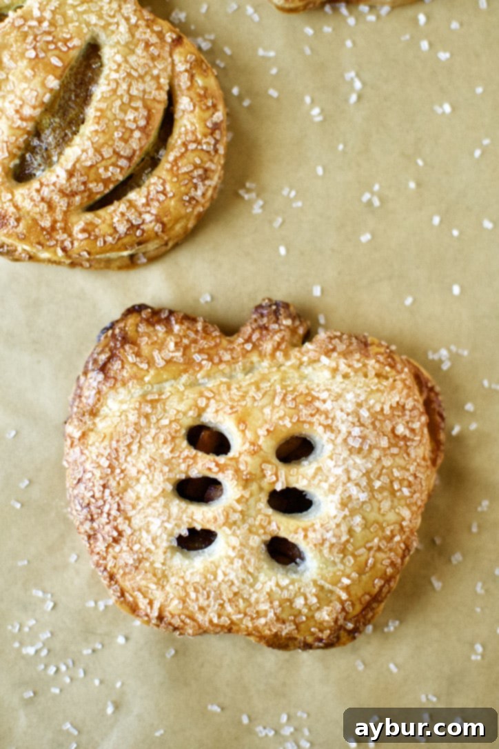 Finished Apple Hand Pies ready to eat, golden brown and glistening.