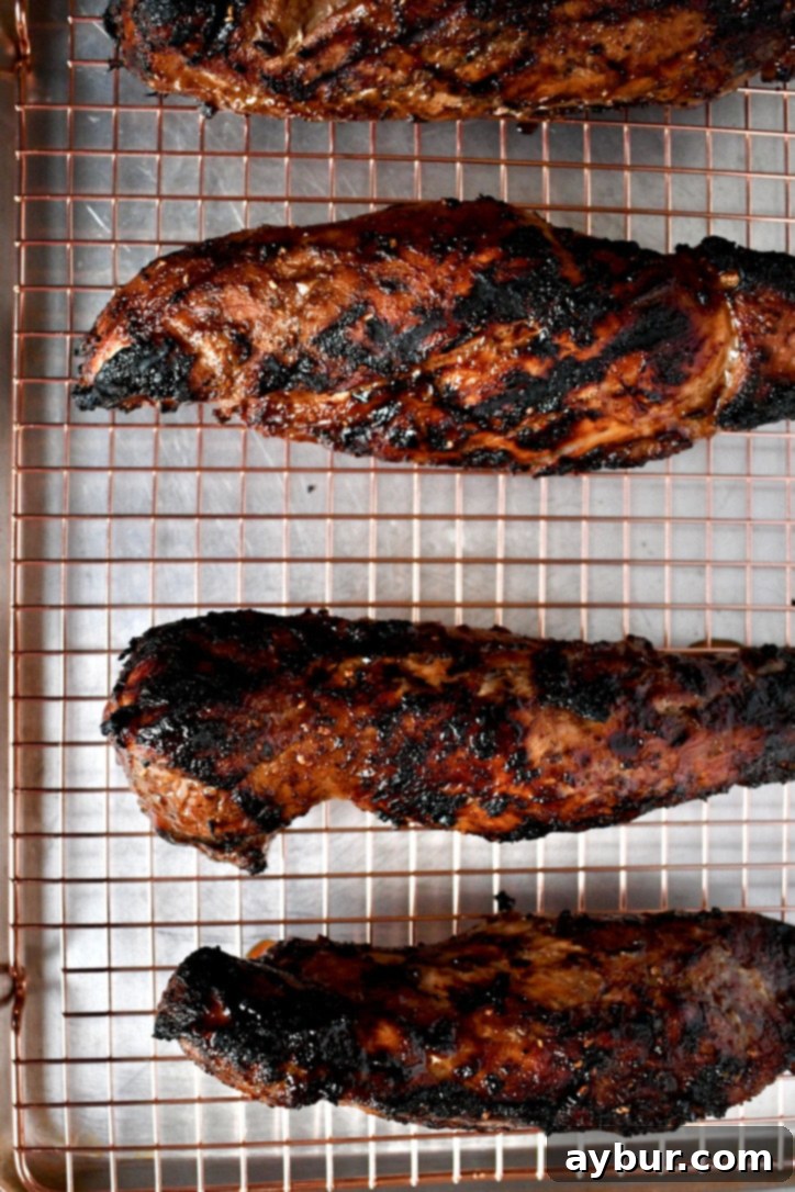 Summer's Sweet & Smoky Grilled Pork Tenderloin 2 Joanna Gaines' Grilled Raspberry Chipotle Pork Tenderloin, perfectly cooked and glazed
