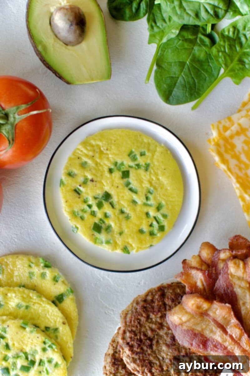 Wholesome Breakfast Sandwich 11 Assembling a breadless egg sandwich with bacon and cheese.