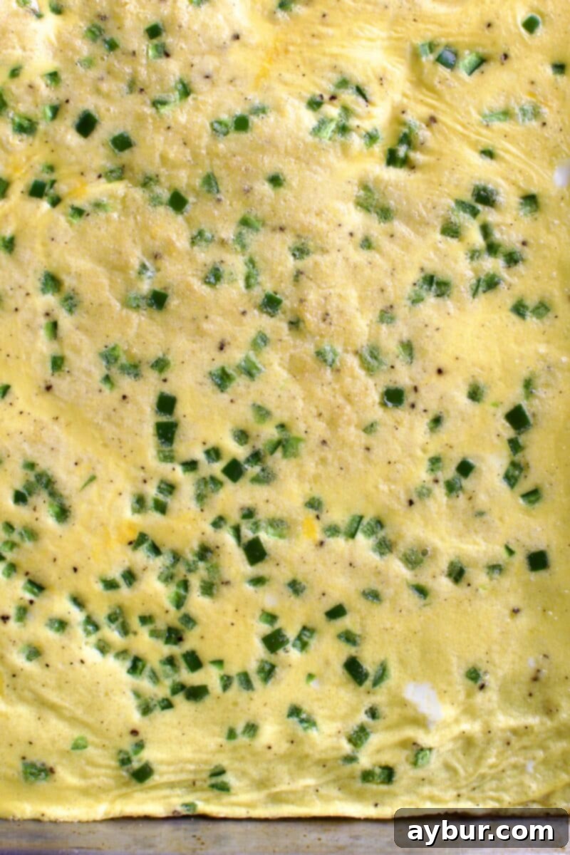 Wholesome Breakfast Sandwich 9 Baked egg slab on the sheet pan, ready for cutting.