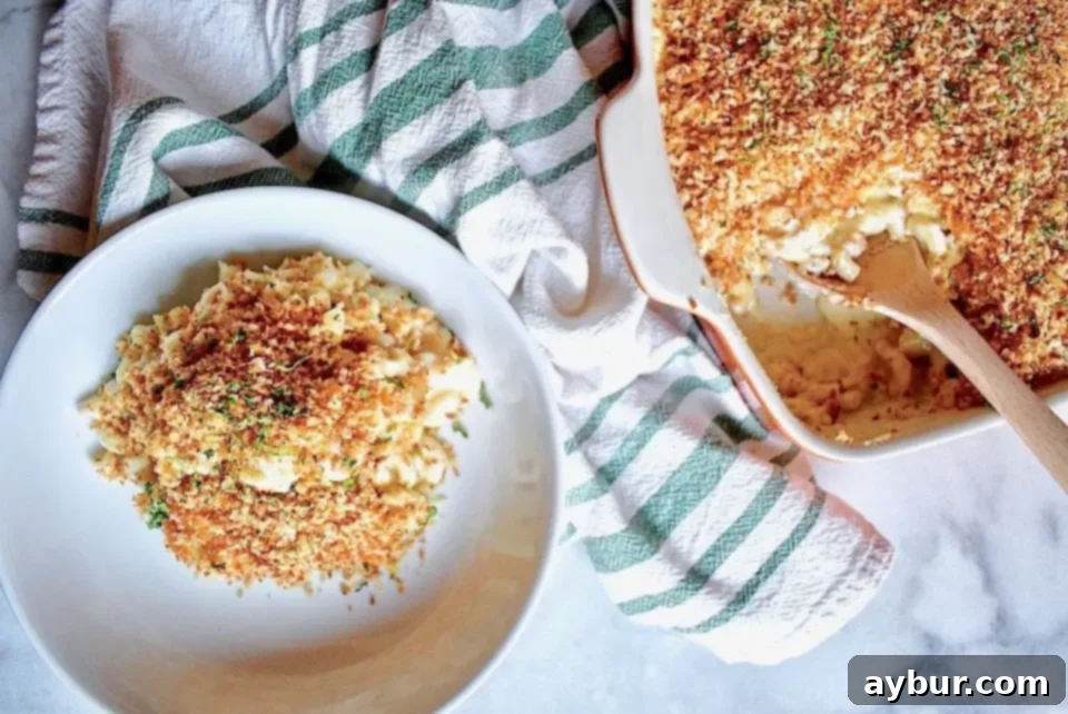 Becki's Mac and Cheese recipe from Joanna Gaines Magnolia Table Cookbook, prepared by KendellKreations, showcasing a golden, bubbly top.