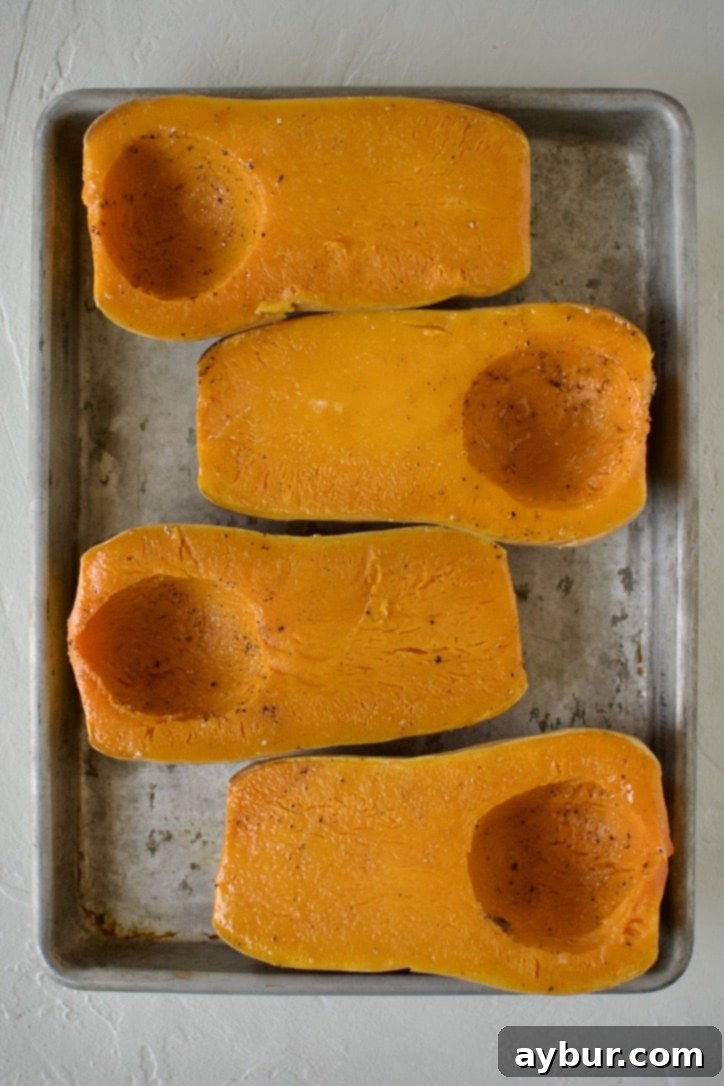 Jalapeño Popper Butternut Squash Boats 5 Perfectly roasted butternut squash halves, tender and slightly caramelized, after 40 minutes in the oven.