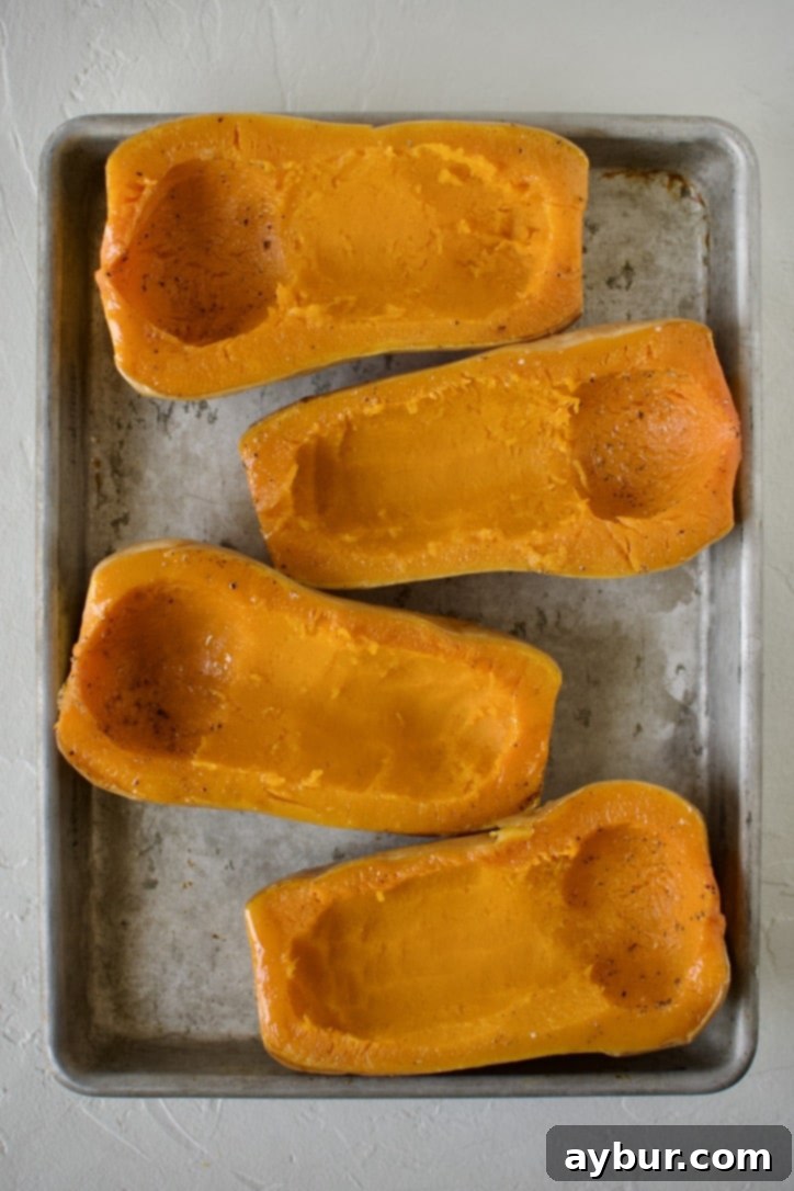 Jalapeño Popper Butternut Squash Boats 6 Roasted butternut squash halves, with a portion of the flesh scooped out to create space for the stuffing.