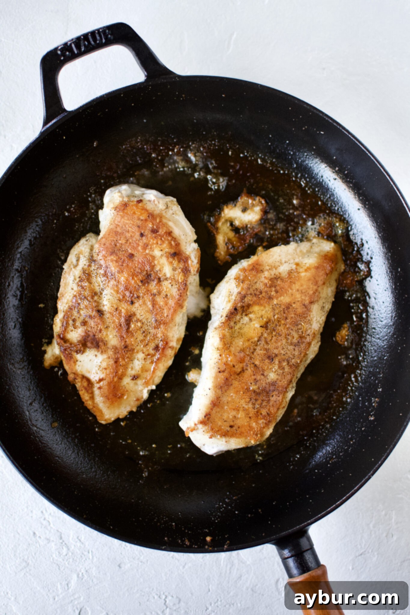 Mediterranean Lemon Orzo Chicken 6 Searing the chicken in the pan.