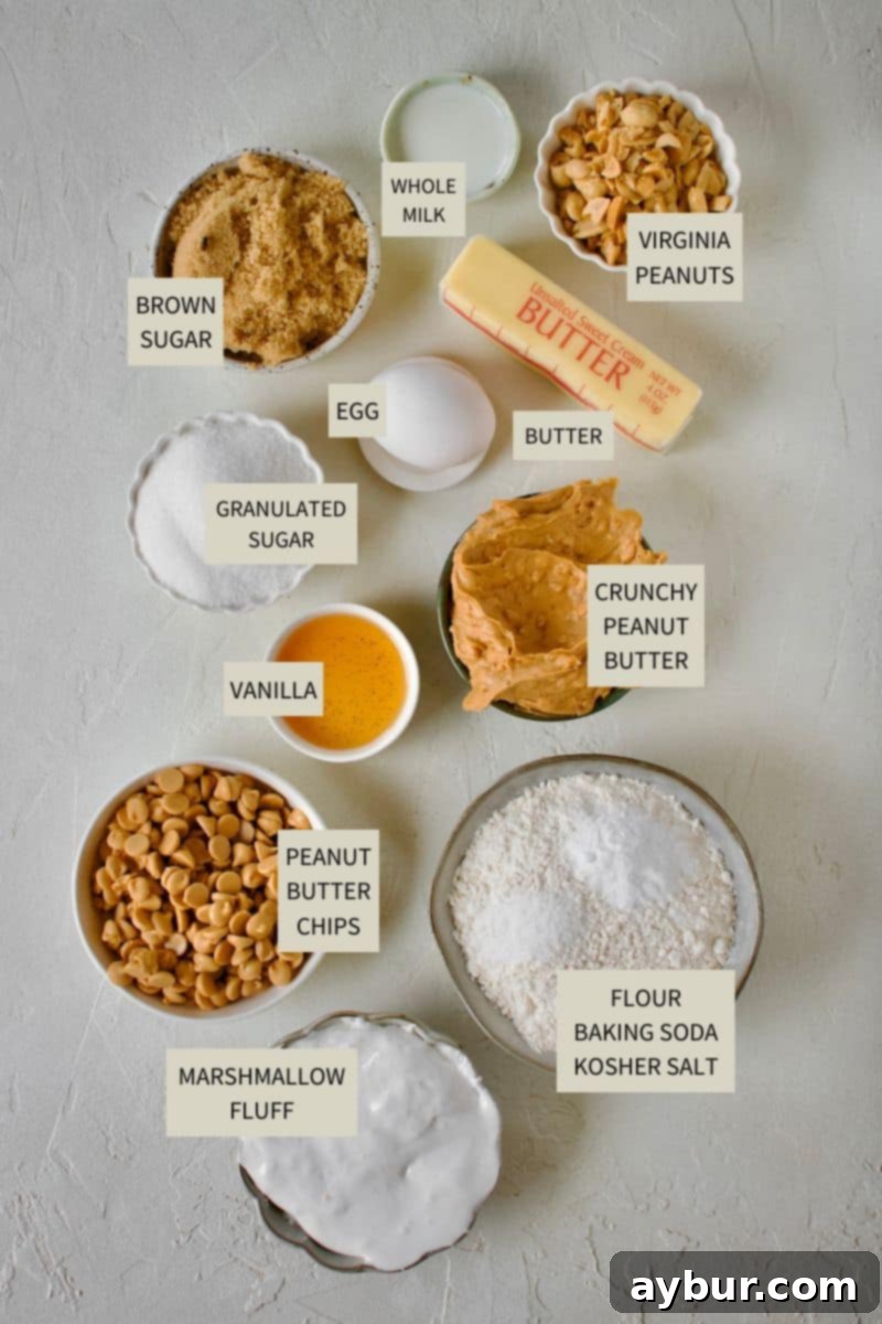 A curated display of all the essential ingredients laid out for baking homemade Fluffernutter Cookies.