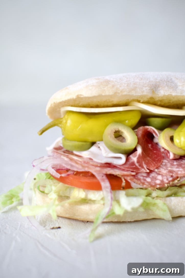 Freshly sliced Italian Sub Sandwich, ready to be enjoyed.