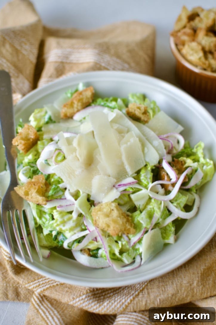 Homemade Classic Caesar Salad with creamy dressing, perfect for dinner.