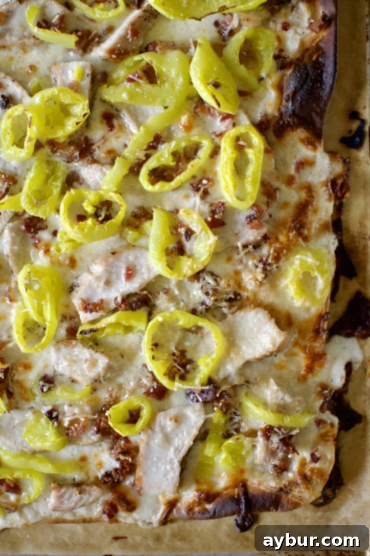 White Pizza Recipe fresh out of the oven and garnished.