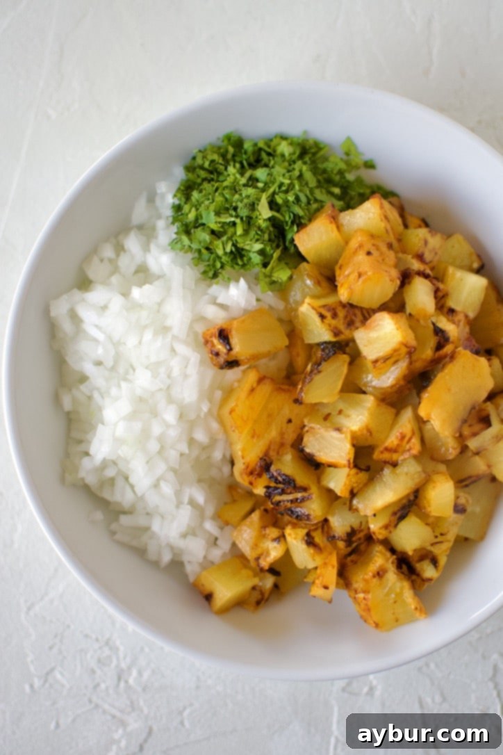 Authentic Al Pastor Tacos 8 Freshly chopped roasted pineapple, white onion, cilantro, and lime juice mixed together to form a vibrant taco topping.