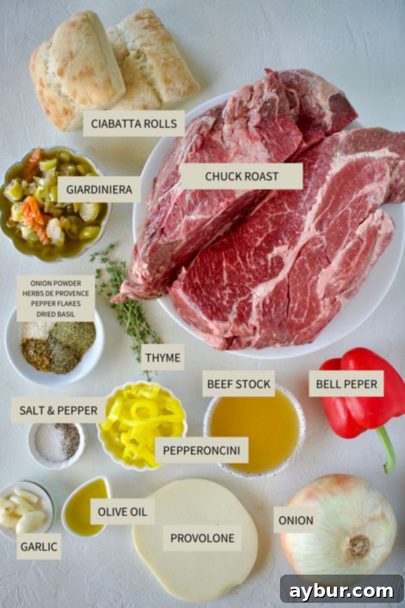 A top-down view of all the ingredients needed to prepare the homemade Italian Beef Sandwiches Recipe, neatly arranged.