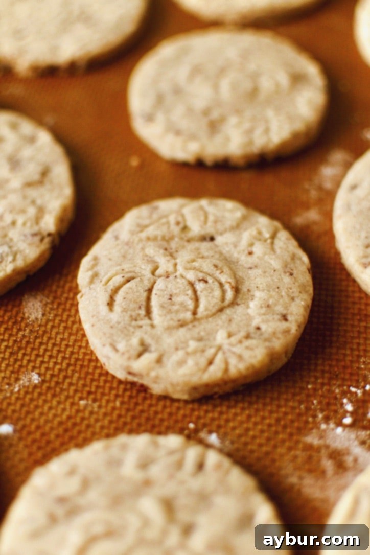 Freshly baked Maple Bacon Pecan Shortbread Cookies piled high, ready to be enjoyed.
