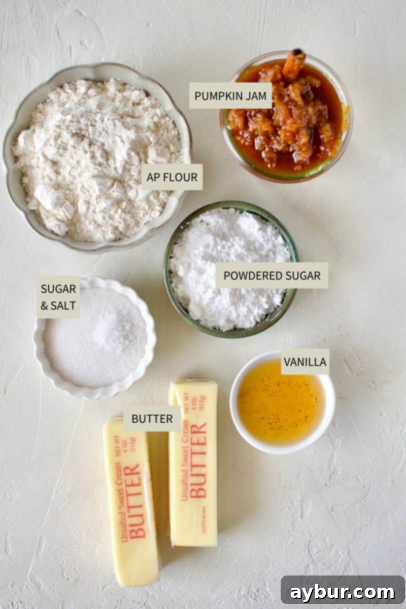 Spiced Pumpkin Delights 3 Close-up shot of the raw ingredients for pumpkin tartlets, including butter, flour, and a jar of pumpkin jam.