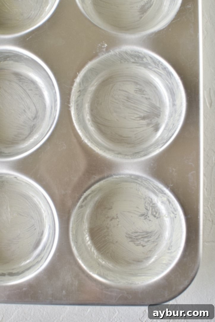 Spiced Pumpkin Delights 5 Flour and salt being added to the creamed butter mixture in a stand mixer.