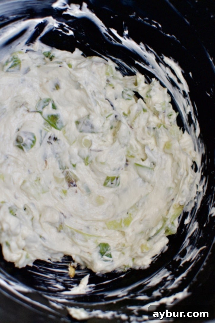 Cooked Scallions whipped into the cream cheese.