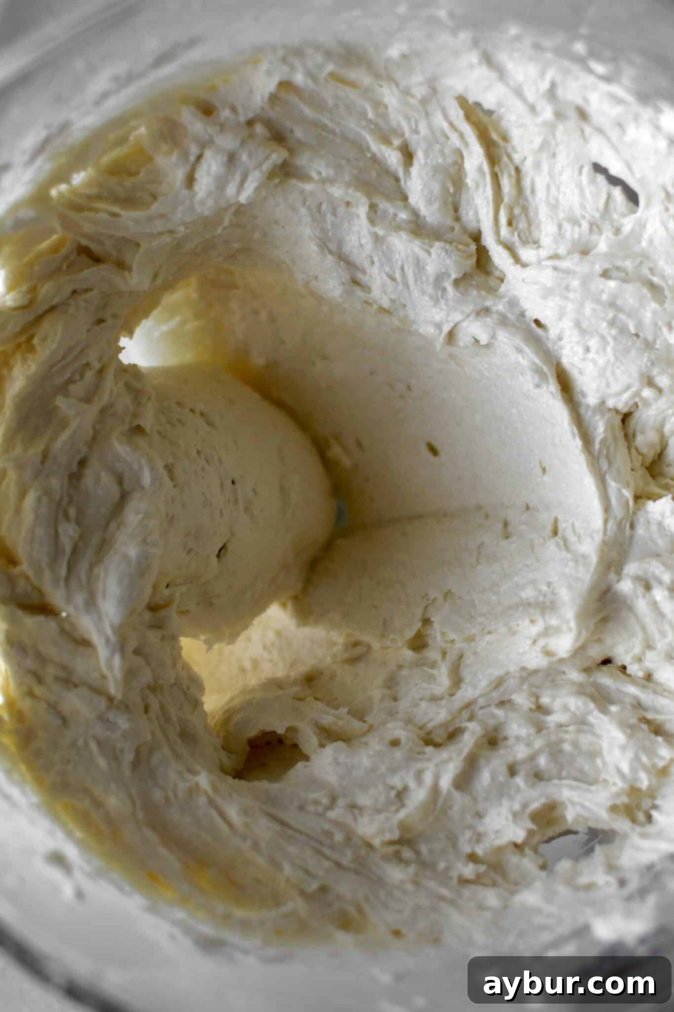 Pumpkin Spice Swirl Pound Cake 6 Pound Cake batter all mixed up in a stand mixer bowl.