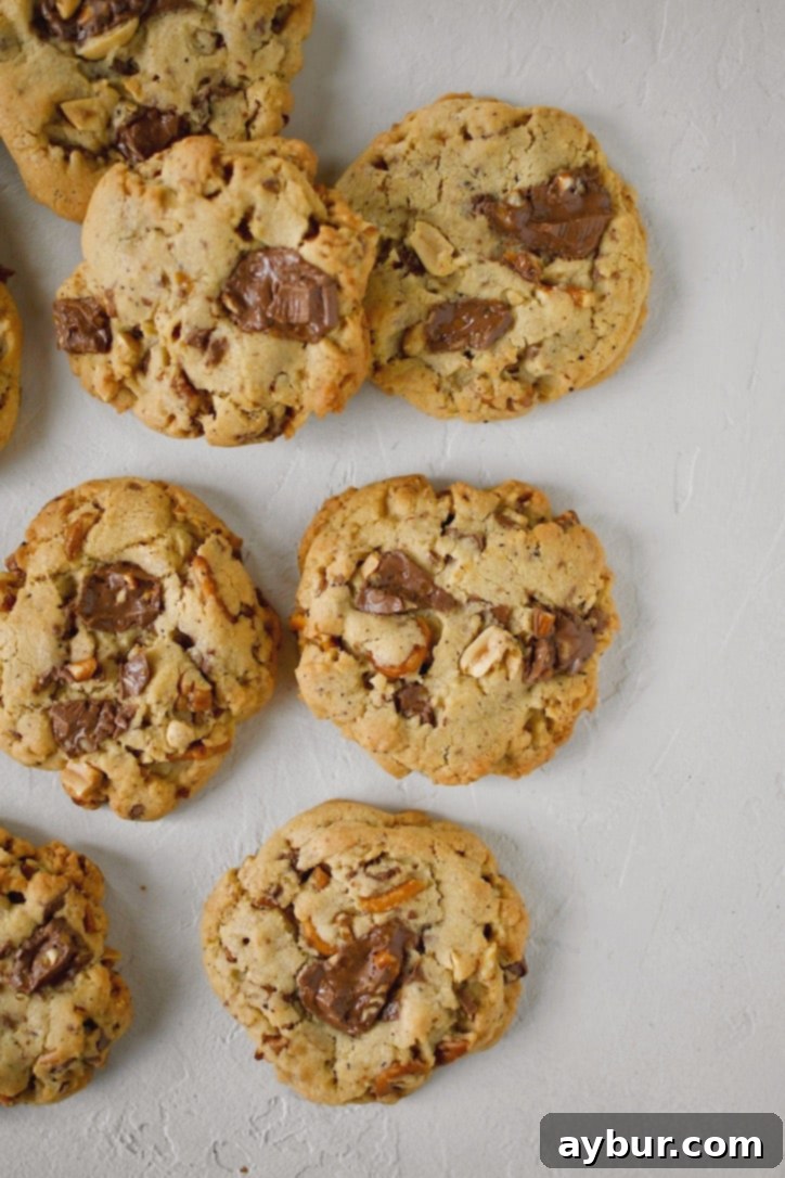 Beautifully baked Kitchen Sink Cookies on a wire rack, ready for enjoyment.