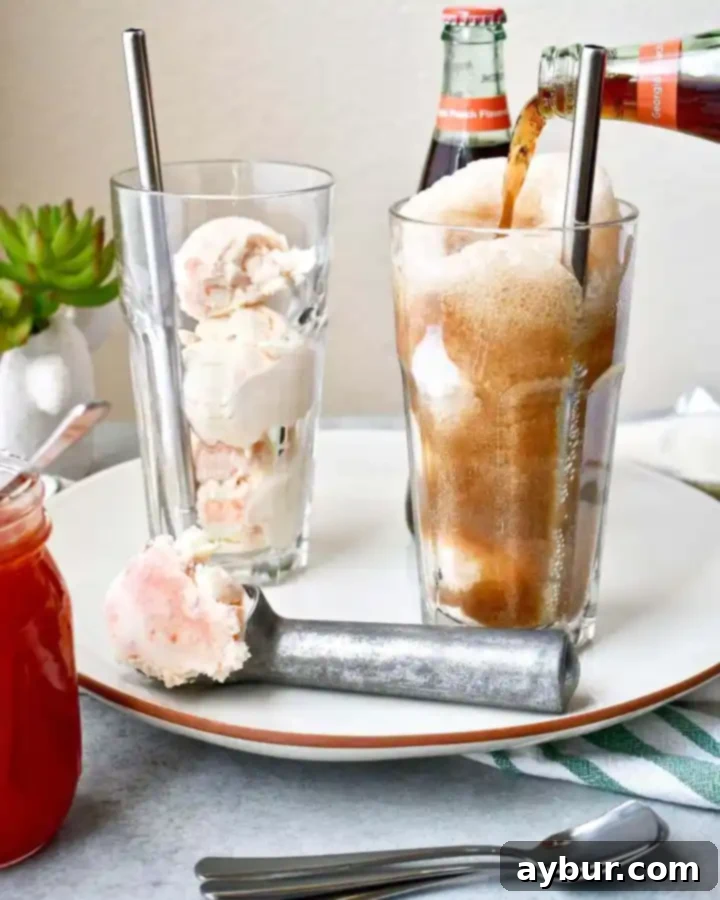 Creamy Fizz Delight 5 Two glasses of Peach Jam Ice Cream Sodas ready to serve